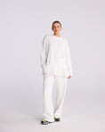 Load image into Gallery viewer, Stieglitz Brisa Skate Longlseeve met ruffle - wit
