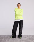 Load image into Gallery viewer, STIEGLITZ BASIC WORN OUT SWEATER – NEON GELE TRUI
